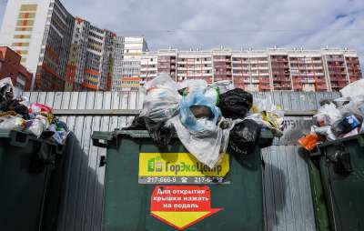 По данным городской администрации, затруднений с вывозом бытовых отходов ни в одном из районов нет. Иллюстрация Донат Сорокин/ТАСС