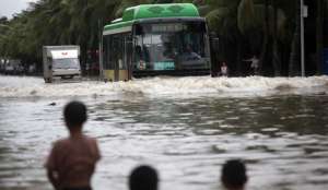 В Китае в результате наводнений погибли 15 человек. Фото EPA с сайта &quot;Голос России&quot;