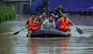 В Центральном Китае из-за наводнения эвакуированы более 5 тысяч человек. Фото EPA с сайта &quot;Голос России&quot;