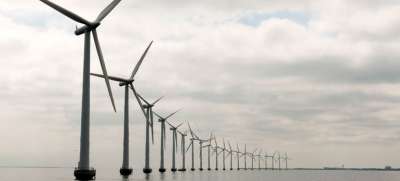 Ветряная электростанция в Дании. Фото ООН/Э.Дебебе