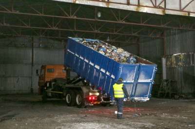 Вывоз твердых отходов для дальнейшей переработки. © / Павел Львов / РИА Новости