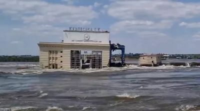 Место разрушения Каховской ГЭС. Кадр видео. Архивное фото РИА Новости.