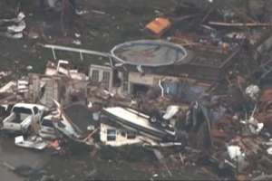  Последствия торнадо в городе Мур Изображение: кадр CNN